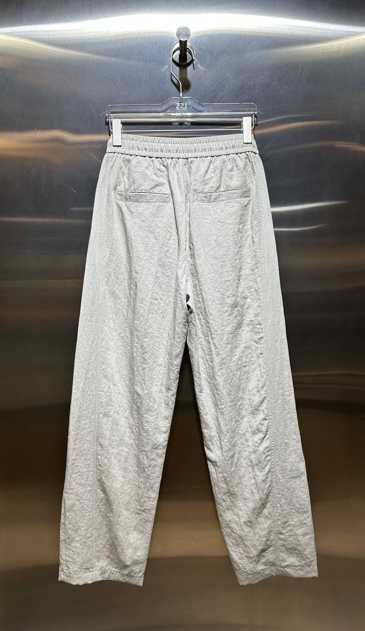 Ivory Textured Wide-Leg Trousers in Ivory