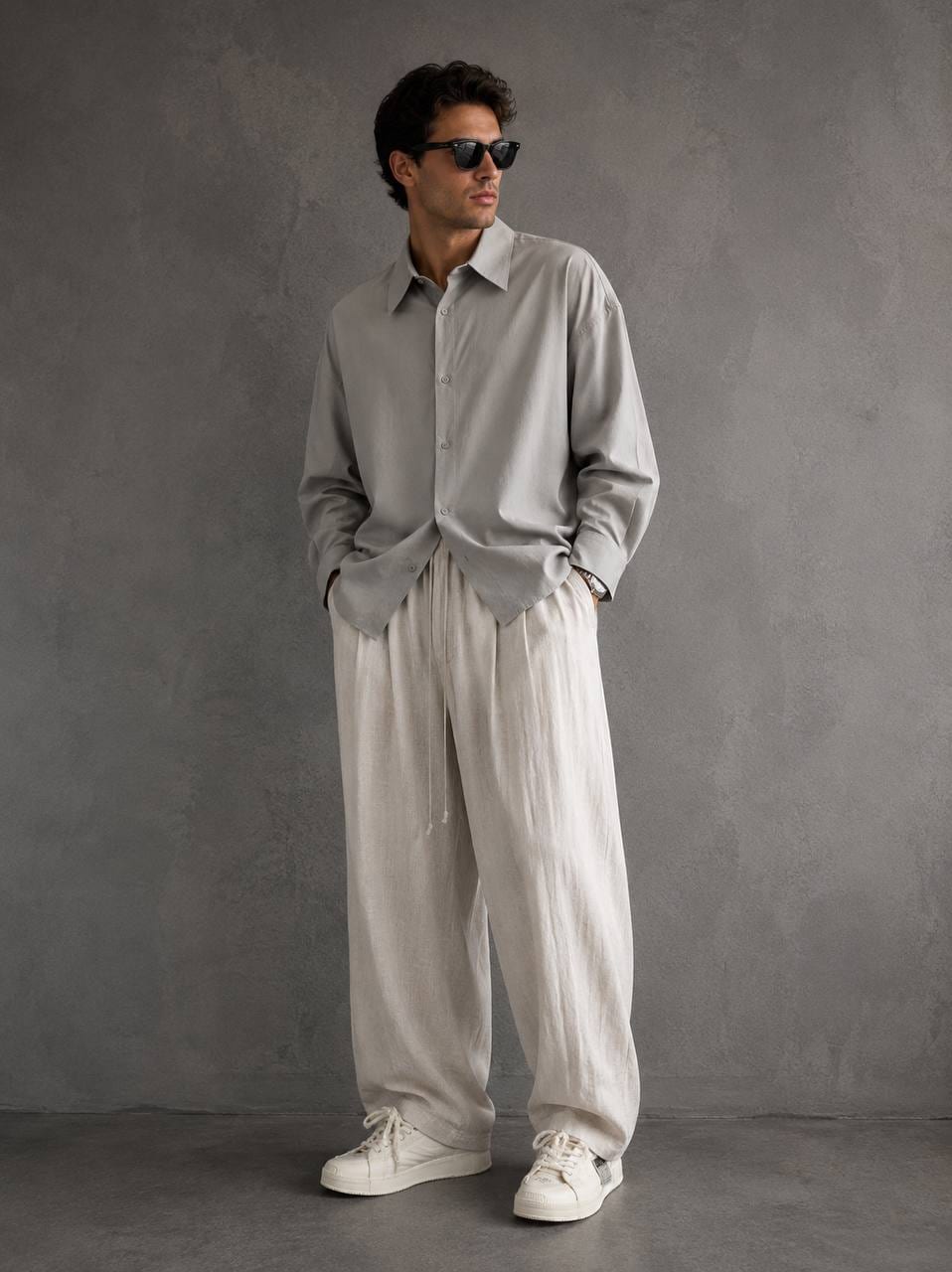 Stone Pleated Wide-Leg Trousers in Stone